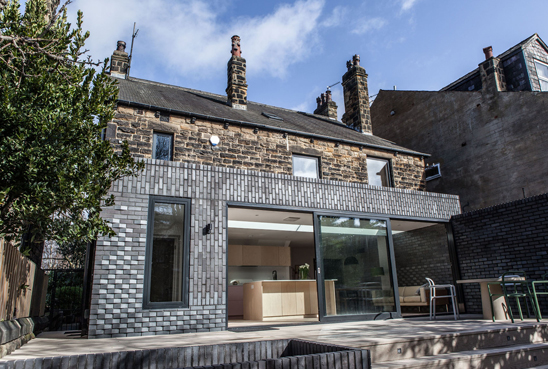 doma architects woven brick house roundhay- view from garden